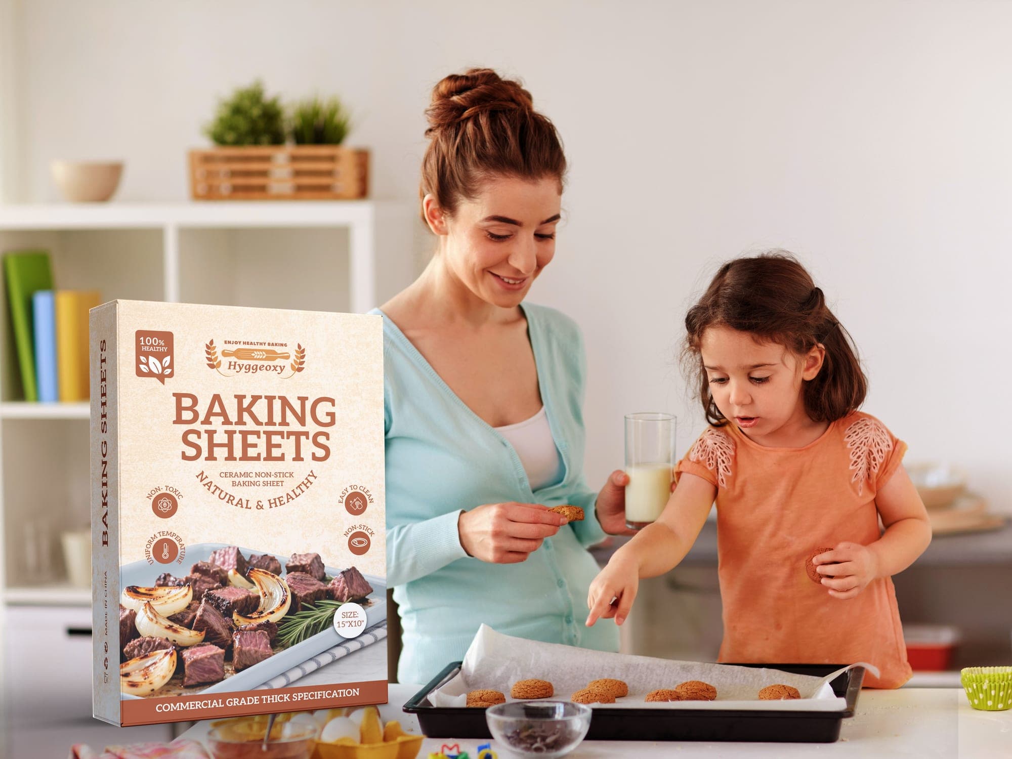 A mother and daughter baking cookies in a home kitchen with the Hyggeoxy carton placed in the foreground